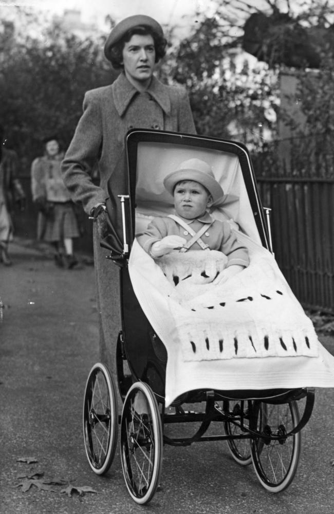 Prince Charles as a toddler, pictured with his former nanny Mabel Andersen, who was brought out of retirement to mend his childhood teddy bear.