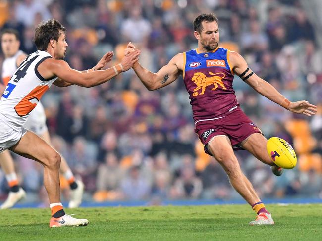 Luke Hodge takes a kick for Brisbane. Picture: Darren England