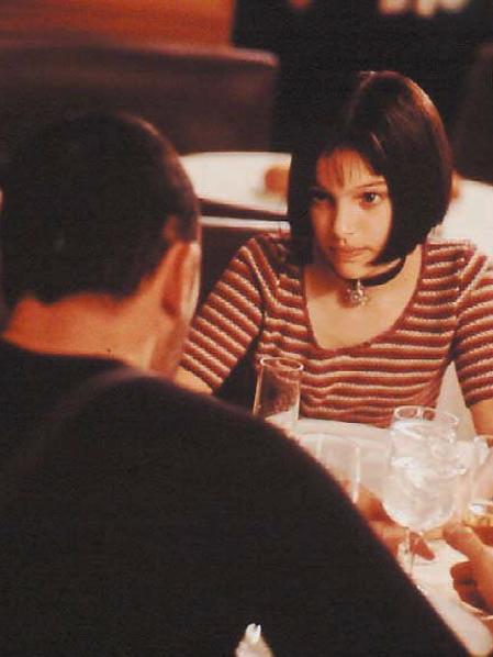 A young Natalie Portman with Jean Reno in Besson’s 1994 film Leon: The Professional. Picture: Supplied