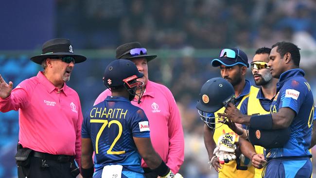 Angelo Mathews tried to argue with umpires after he became the first player in international cricket to be given timed out. Picture: Arun Sankar/AFP