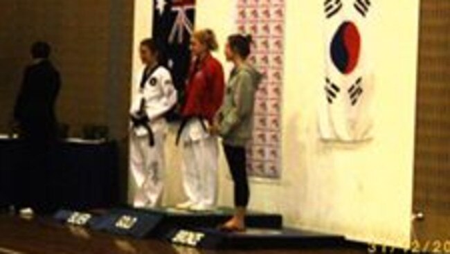 Cassie during the medal ceremony at the Australian Institute of Sport after qualifying for the Australian team.