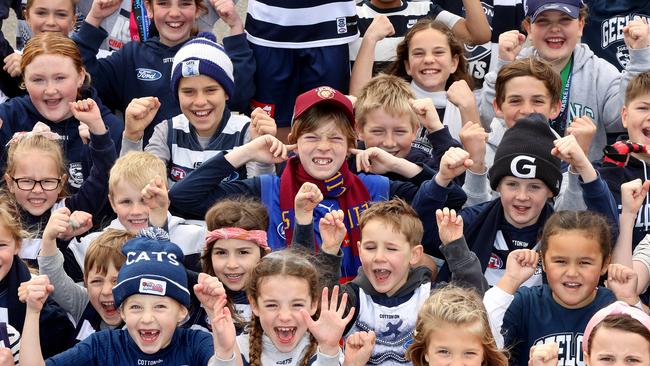 Twelve year old Austin Britnell is a lone Lion in a clowder of Cats fans at Belmont Primary School ahead of the AFL preliminary final. Picture: Alison Wynd