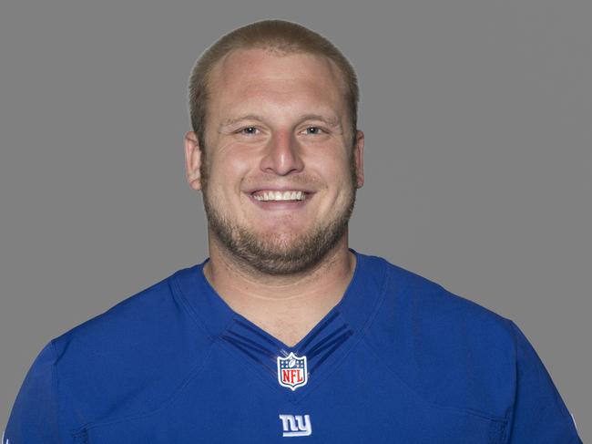 FILE - This 2012 file photo, shows Mitch Petrus of the New York Giants NFL football team. Officials say Petrus, a former Arkansas offensive lineman who later won a Super Bowl with the New York Giants, has died in Arkansas of apparent heat stroke. He was 32.  Pulaski County Coroner Gerone Hobbs says Petrus died Thursday, July 18, 2019, at a North Little Rock hospital. Hobbs says Petrus had worked outside all day at his family shop, and that his cause of death is listed as heat stroke. (AP Photo/File)