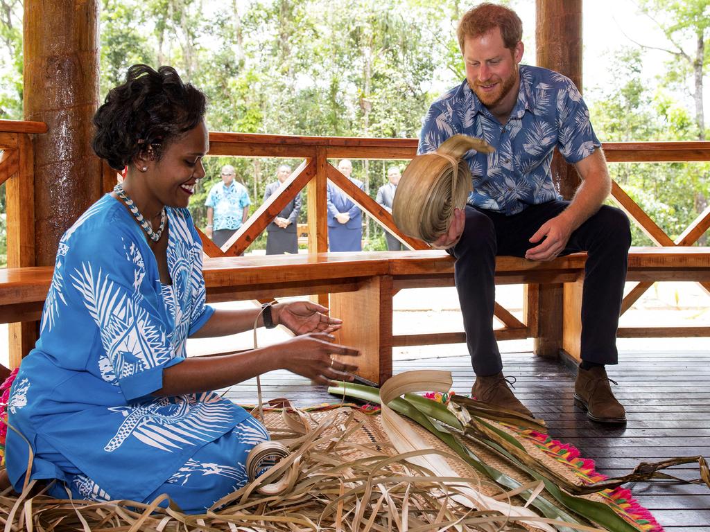 The Duke of Sussex watches a demonstration of traditional mat weaving as he attends a dedication of the Colo-i-Suva forest to the Queen's Commonwealth Canopy in Suva.