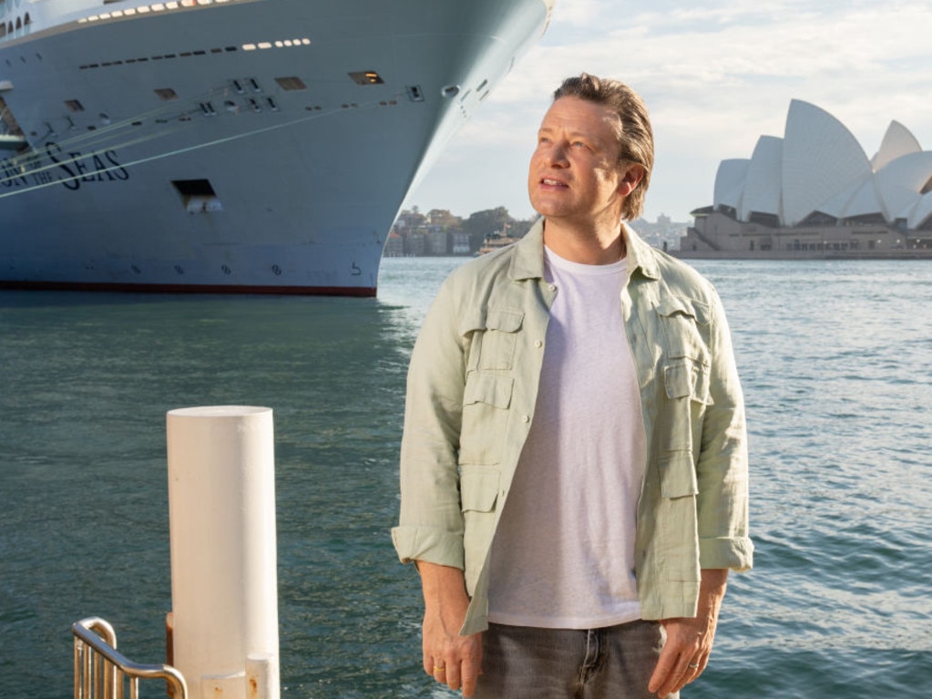 And here he is giving his best pose in front of the ship docked at Circular Quay. Picture: Rocket Weijers/Getty Images
