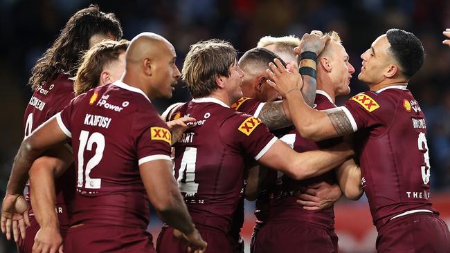 Queensland celebrate during their Game 1 ambush. Photo by Mark Kolbe/Getty Images.