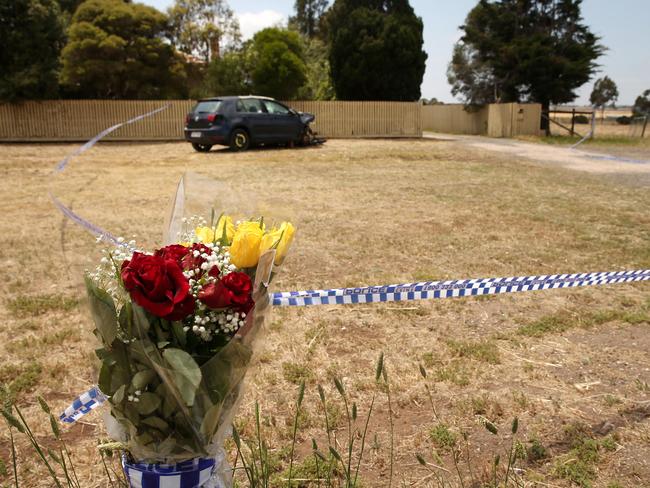 Flowers left at the Lara property where Scott Muston was shot dead. Picture: Alison Wynd