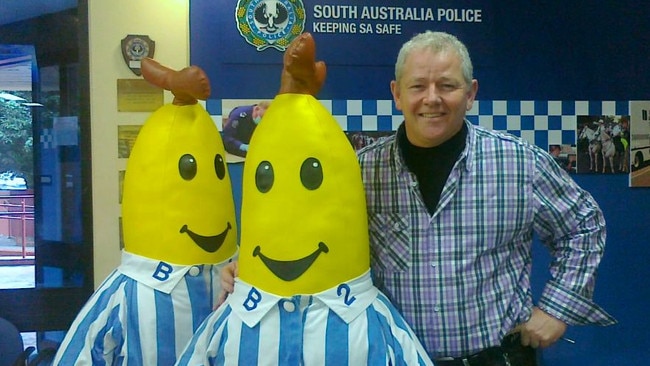 ABC 891 roving reporter Spence Denny with Bananas In Pyjamas soft toys that were stolen from the ABC building foyer in Collinswood.