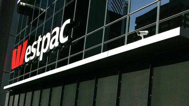 The Westpac building on Kent St alongside the Western Distributor has put screens over the windows near the passing traffic and installed a security camera after missiles had been thrown .