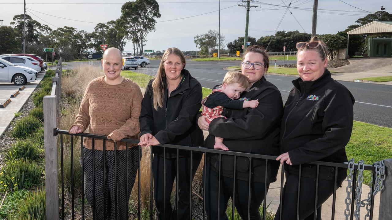 Childcare workers and parents Rebecca Gage, Melissa Waters, August and Tess Dixon with Tiffany Caddy in front of the intersection of Kensington Rd and Portarlington Hwy, Leopold. Picture: Brad Fleet