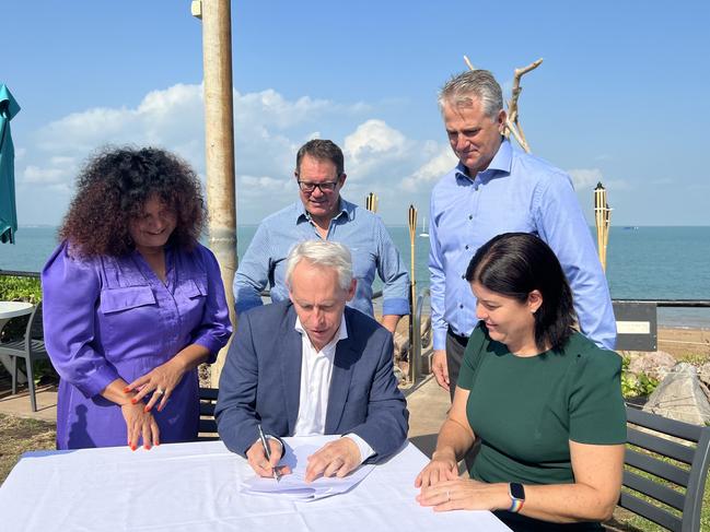 Senator Malarndirri McCarthy, Solomon MP Luke Gosling, Jobs Minister Joel Bowden, Federal Immigration Minister Andrew Giles, and Chief Minister Natasha Fyles sign an extension to the DAMA visa program bringing skilled migrant workers to the NT. Picture: Fia Walsh