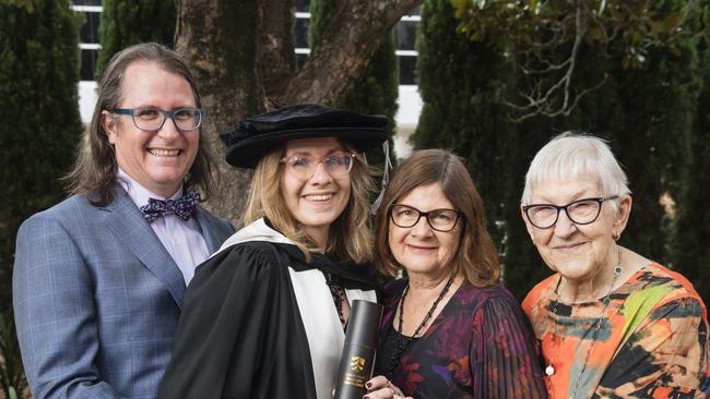 Doctorate of Creative Arts graduate Tara East with (from left) Ashley Dean, Bev Miller and Pearl Rognoni at a UniSQ graduation ceremony at Empire Theatres, Tuesday, February 13, 2024. Picture: Kevin Farmer