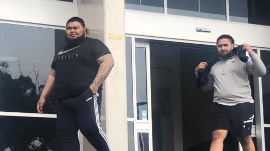 Benjamin Falefoou, 21, (left) leaves Mt Druitt Local Court on January 16. He has pleaded guilty to his part in a brawl at a football match in Mt Druitt last October.