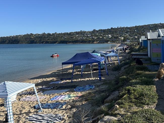 Early birds are setting up cabanas at Safety Beach on the Mornington Penisula as early as 6.30am on hot days in order to claim a spot on the sand. Picture: supplied.