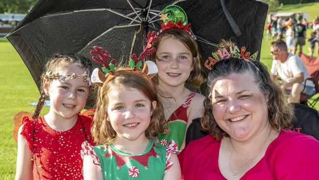 (From left) Mila Bentley, Marley Blinco, Bronte Blinco and Kellie Blinco. Triple M Mayoral Carols by Candlelight. Sunday 8th December, 2024. Picture: Nev Madsen.