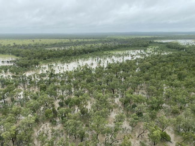 Floodwaters of the Belyando and Sutter rivers, taken by helicopter pilot James Pleaotz on Sunday.