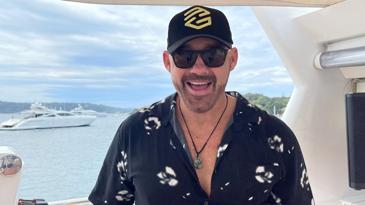 Mark Geyer on Sydney Harbour celebrating Penrith's 30-year premiership reunion.