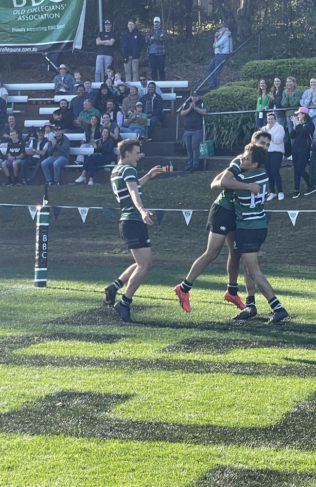 Samson Tuqiri (tryscorer) met by teammates after his amazing try set up by Jamie Alexander (left).