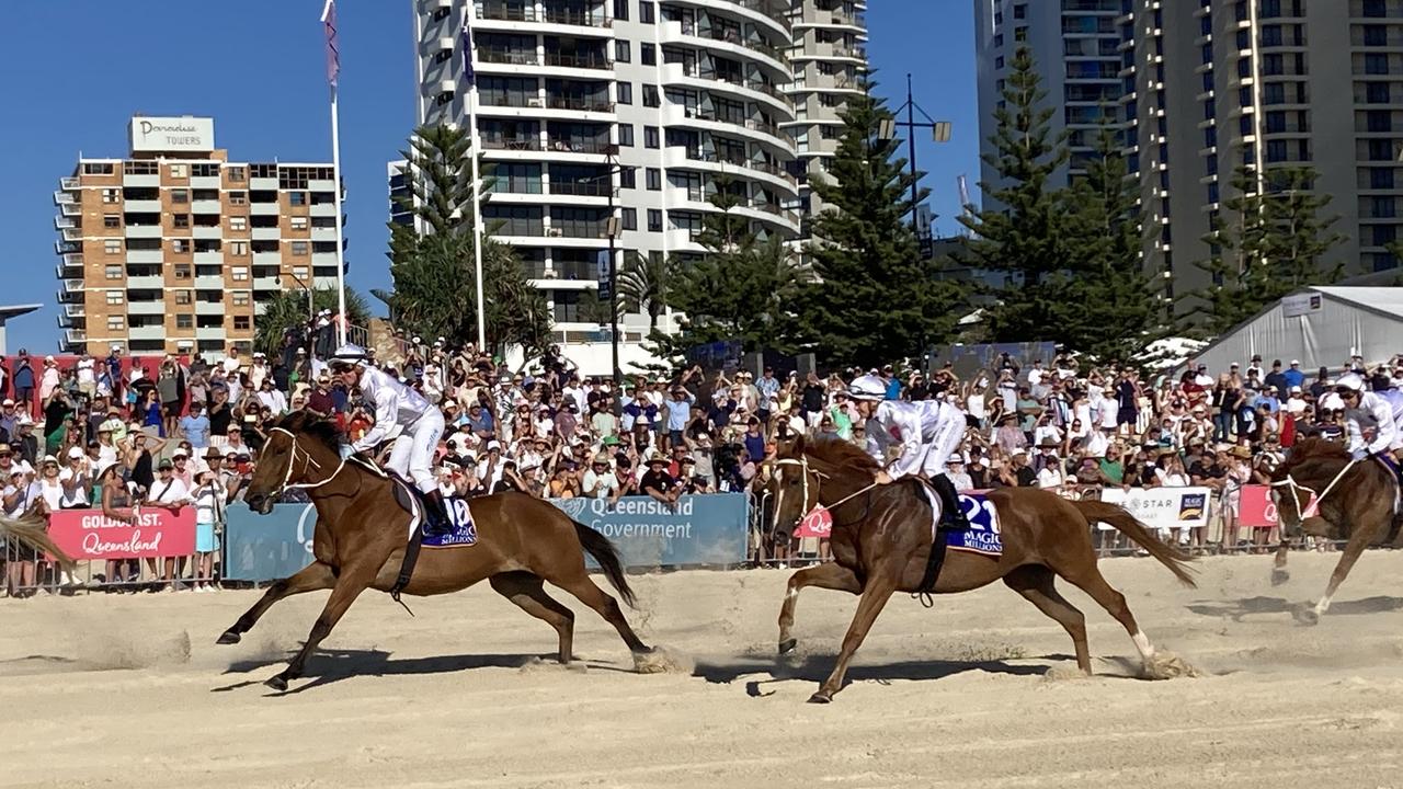 The Barrier Draw event showcasing an exhibition run of thoroughbreds down the Surfers Paradise beach, watched on by holiday makers and racing enthusiasts alike.