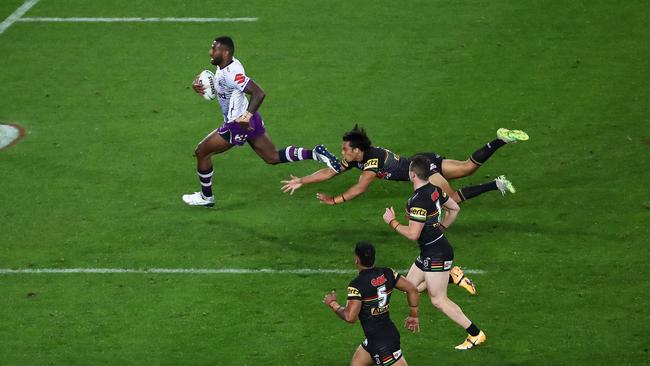 Melbourne’s Suliasi Vunivalu streaks away to score after taking Cleary’s intercept.