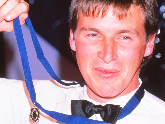 MELBOURNE, AUSTRALIA - 1989:  Paul Couch of the Geelong Cata celebrates after winning the 1989 Browlow Medal in Melbourne, Australia. (Photo by Getty Images)