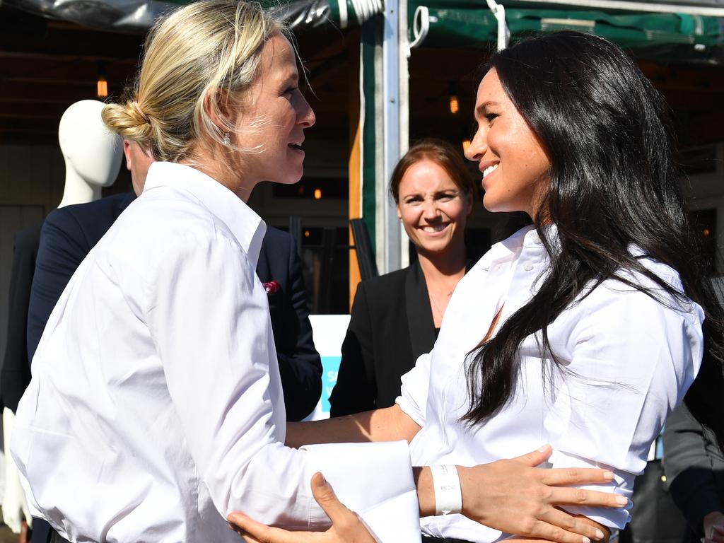 Meghan, Duchess of Sussex embraces designer Misha Nonoo. Picture: Getty