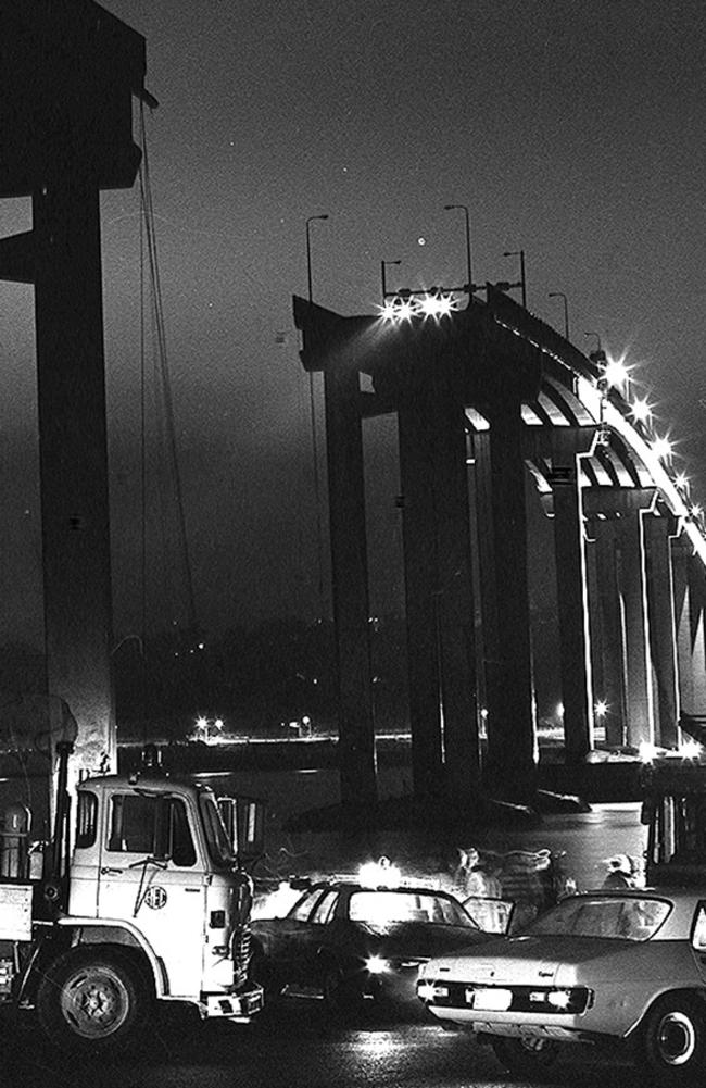 Tasman Bridge Disaster January 1975 with Mercury photographer Don Stephens’ amazing image showing cars on edge taken just after accident.