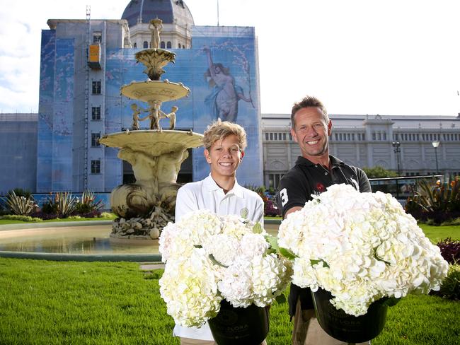 Grower Michael van der Zwet, pictured with son Hunter. Picture: ANDY ROGERS