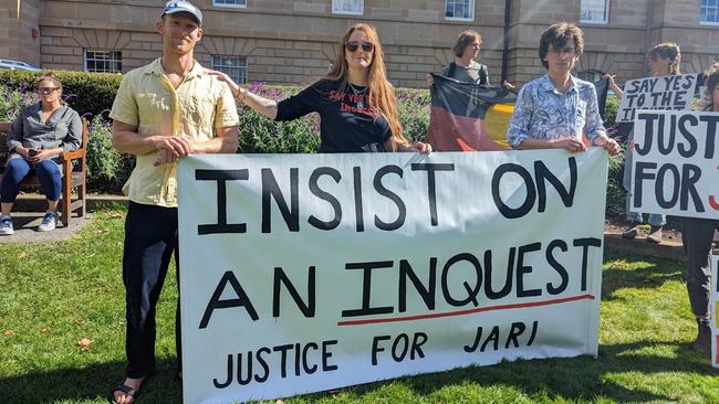 (L to R): Hamish McLean, Faith Tkalac and Ben Mildren at an April 2023 rally calling for an inquest into Jari’s death. Photo: Katie Hall