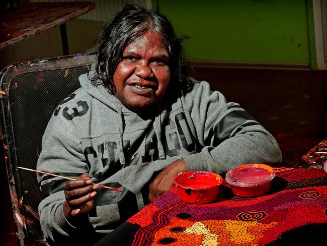 Archibald Prize finalist Tjungkara Ken at the Tjala Arts centre at Amata in the APY lands. Picture: Dylan Coker