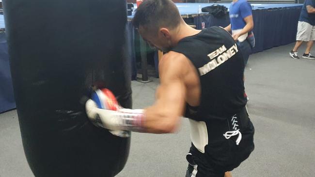 Maloney rips into the bags in preparation for his big fight.