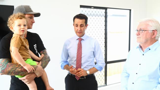 Premier David Crisafulli visits a new housing development at Bentley Park, Cairns with Mulgrave MP Terry James and spoke with first homebuyer Aidan Maxwell and son Harry. Picture: Peter Carruthers