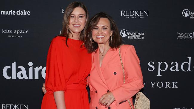 Higgins and Lisa Wilkinson at an International Women's Day breakfast in 2022.