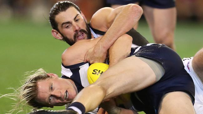 Brodie Grundy mauled Geelong’s stand-in ruckman Mark Blicavs. Picture: Michael Klein