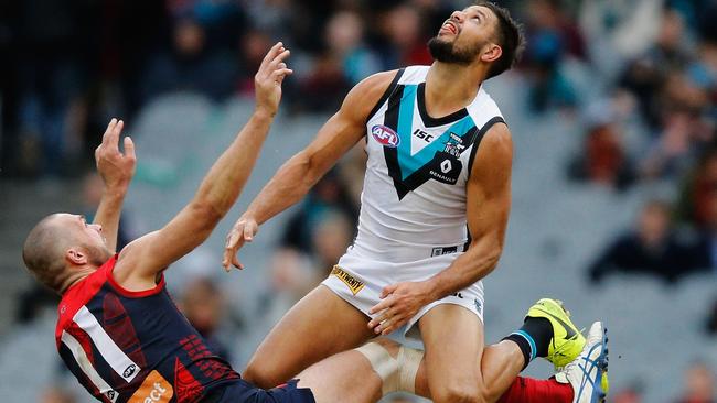 Patrick Ryder of the Power competes for the ball over Max Gawn of the Demons.