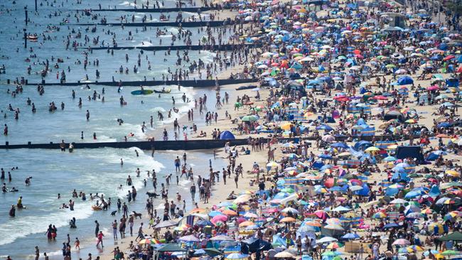 Crowds flocked to Bournemouth beach in southern England during last summer’s heatwave. Picture: Getty Images