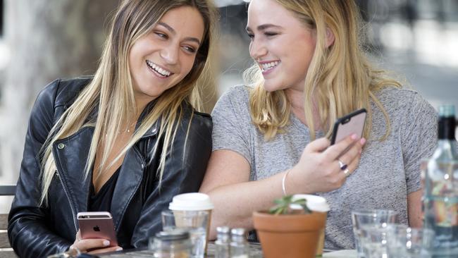 Sisters Sophie and Lucy Welsh are part of the ‘text generation’. Picture: Sarah Matray