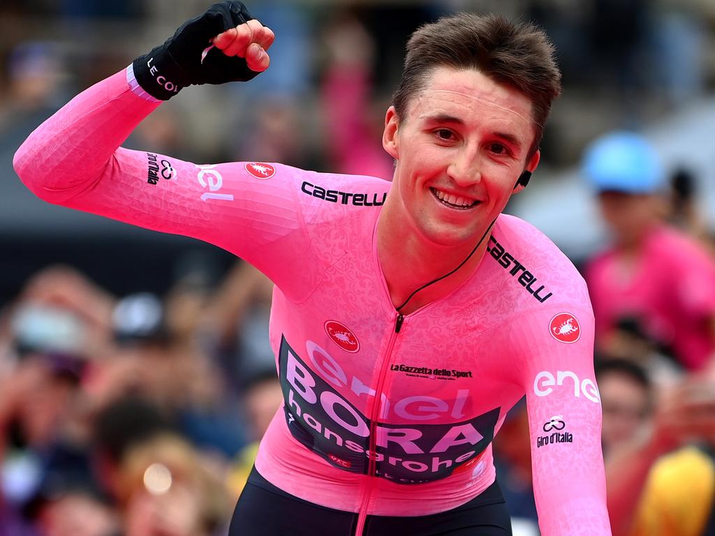 Jai Hindley crosses the finish line and waves to the crowd at the Arena di Verona after becoming Giro d'Italia champion. Picture: Tim de Waele/Getty Images