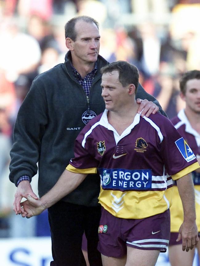 Captain Kevin Walters is congratulated by coach Wayne Bennett after playing his last home game for the Brisbane Broncos (against the Cronulla Sharks) before retiring in 2000. Picture: David Kapernick