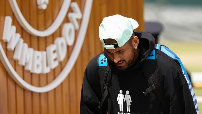 Nick Kyrgios makes his way to the practice courts at Wimbledon. Picture: Getty