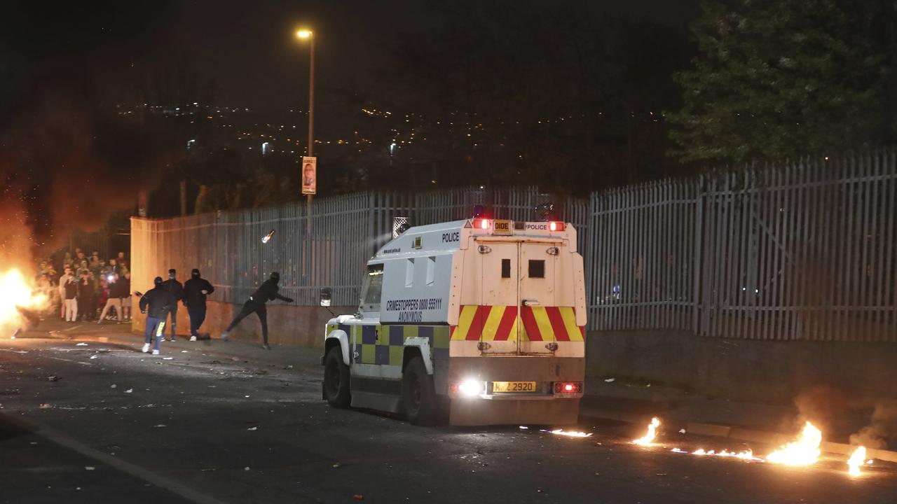 Petrol bombs are thrown at police. Picture: AP