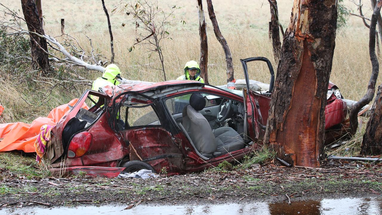 Police remove the crashed car at the Bochara fatal crash scene where four people were killed in a car accident. Picture: NCA NewsWire / David Crosling