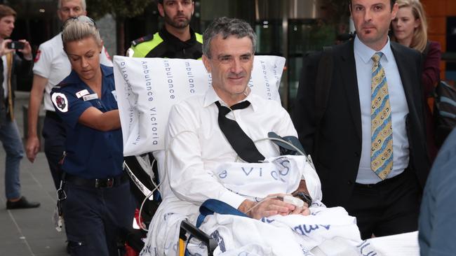 Dover owner Terry McMaster leaving the Federal Court after collapsing during questioning. Picture: AAP Image/Stefan Postles