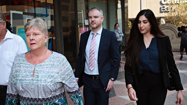 Peter Thistlethwaite (centre) outside court. Picture: Adam Yip