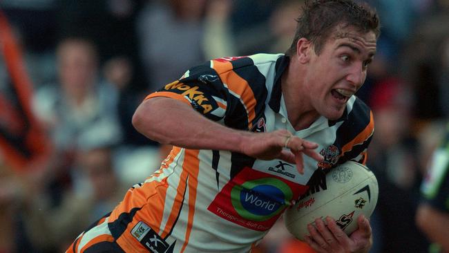 Luke Covell in action for Wests Tigers in 2004. Photo: Jack Atley