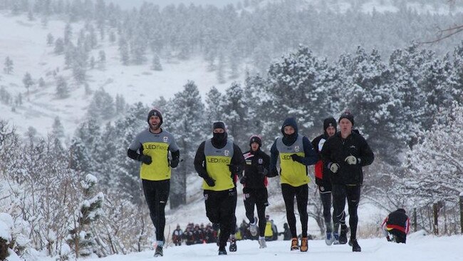 St Kilda players train in the snow in Boulder, Colorado.