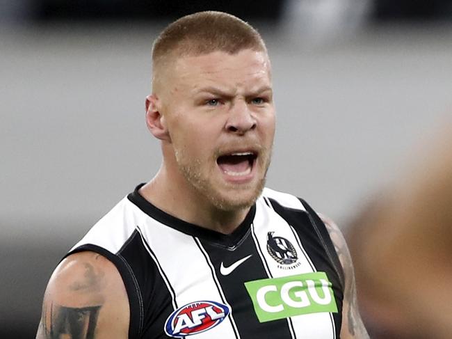 MELBOURNE, AUSTRALIA - MARCH 25: Jordan De Goey of the Magpies celebrates a goal during the 2021 AFL Round 02 match between the Carlton Blues and the Collingwood Magpies at the Melbourne Cricket Ground on March 25, 2021 in Melbourne, Australia. (Photo by Dylan Burns/AFL Photos via Getty Images)