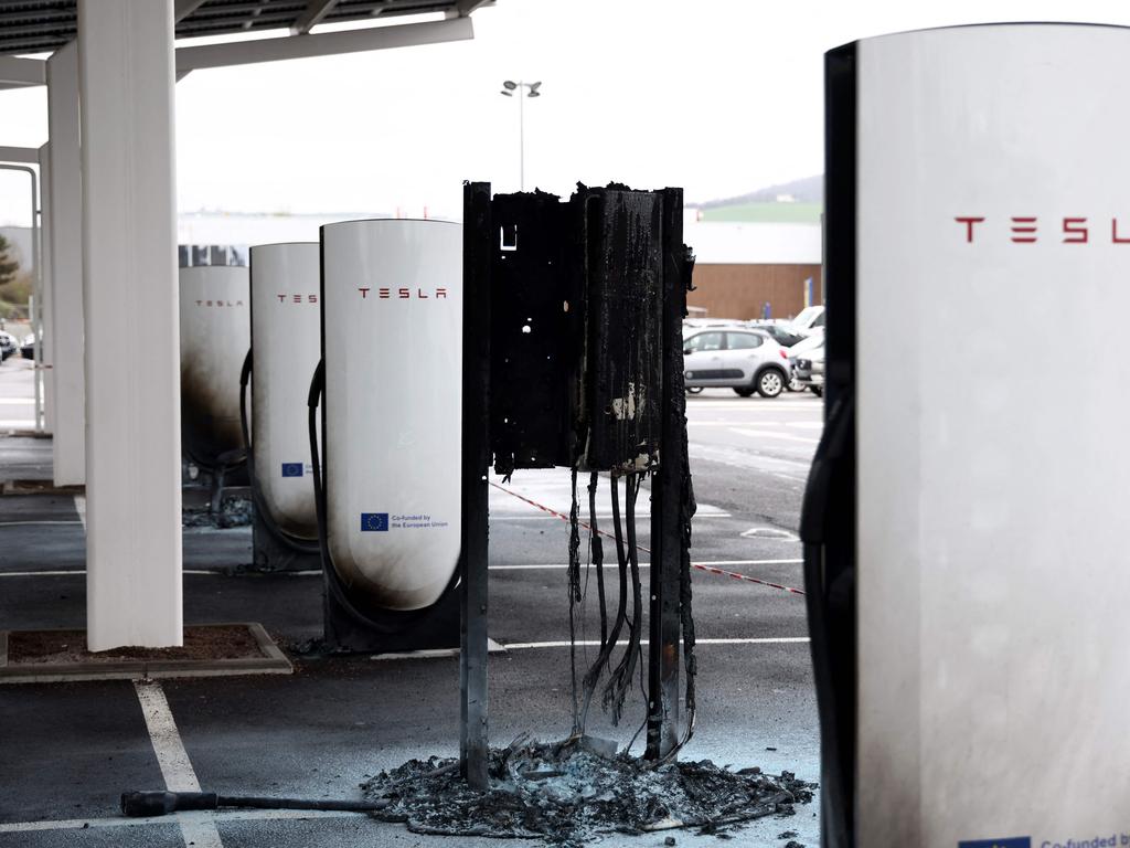 A photo shows damaged and destroyed Tesla charging stations, in Saint-Chamond, central France. Picture: AFP