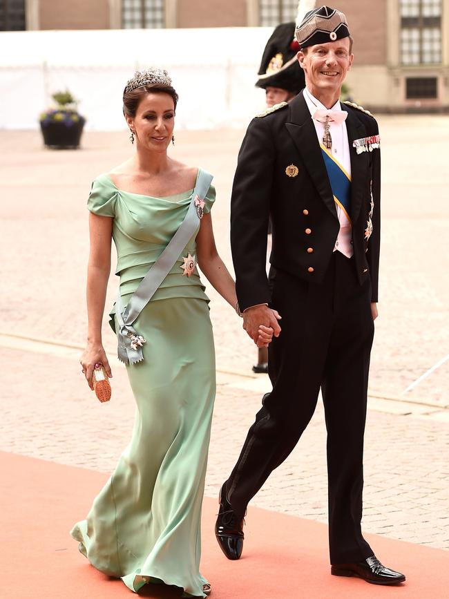 Princess Marie – pictured here with Prince Joachim – will follow Meghan’s lead in staying home in the US with their kids. Picture: Ian Gavan/Getty Images