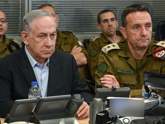 JERUSALEM - JULY 20: (----EDITORIAL USE ONLY  MANDATORY CREDIT - 'ISRAEL PRIME MINISTER'S OFFICE / HANDOUT' - NO MARKETING NO ADVERTISING CAMPAIGNS - DISTRIBUTED AS A SERVICE TO CLIENTS----) Israeli Prime Minister Benjamin Netanyahu (L), Chief of the General Staff of the Israel Defense Forces Herzi Halevi (R), and Israeli Defense Minister Yoav Gallant (not seen) follow the attack by Israeli warplanes Hudaydah Port in Yemen, controlled by the Iran-backed Houthis on the Red Sea coast, from the operations center in Jerusalem on July 20, 2024. (Photo by Israeli Prime Minister's Office / Handout /Anadolu via Getty Images)